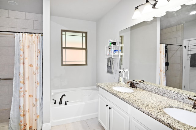 bathroom with independent shower and bath, vanity, and tile patterned floors