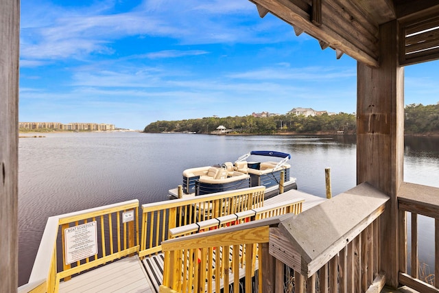 view of dock with a water view