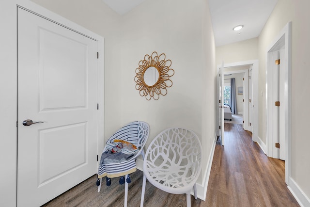 corridor featuring hardwood / wood-style flooring