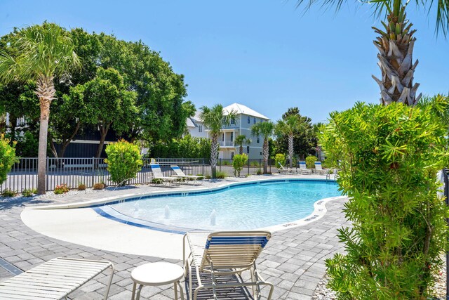 view of swimming pool featuring a patio