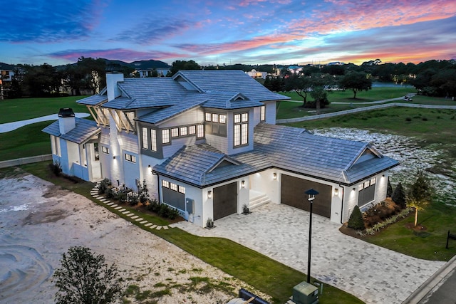 view of front of home with a garage