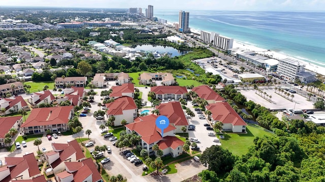 aerial view with a beach view and a water view