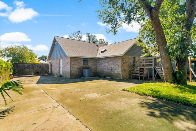 exterior space with a patio area and a yard