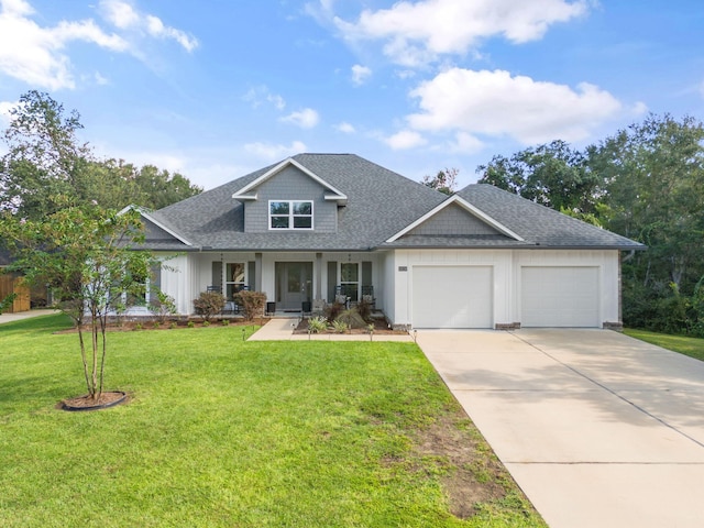 craftsman house featuring a garage, a porch, and a front lawn