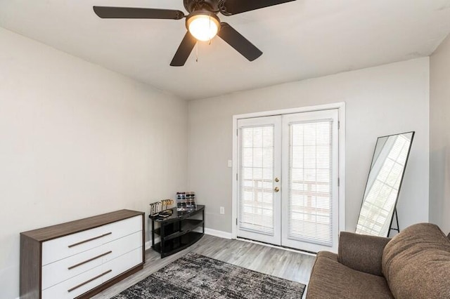 doorway to outside with ceiling fan, french doors, wood finished floors, and baseboards