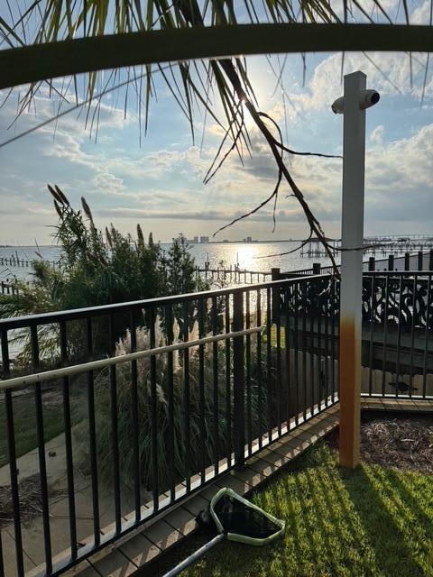 balcony featuring a water view