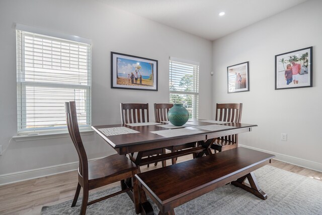 dining space featuring light hardwood / wood-style floors