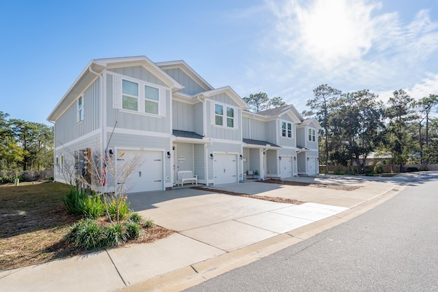 multi unit property featuring a garage