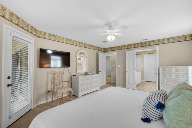 carpeted bedroom featuring ceiling fan and access to exterior