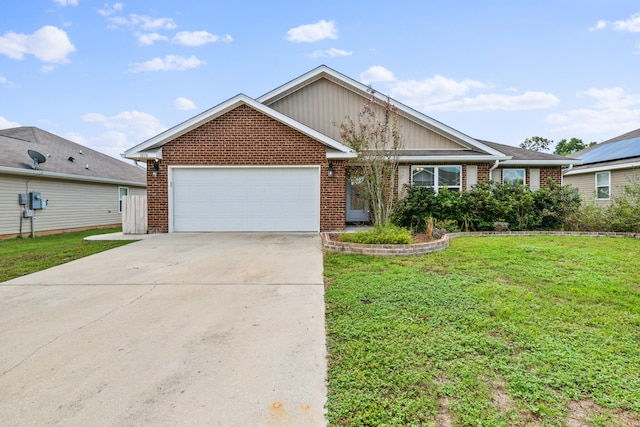 view of front of house with a front lawn and a garage