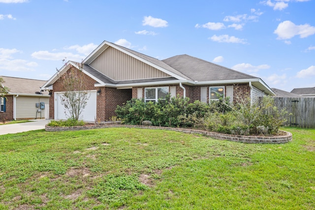 view of front of property with a garage and a front lawn