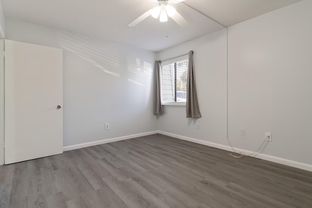 unfurnished room featuring hardwood / wood-style flooring and ceiling fan