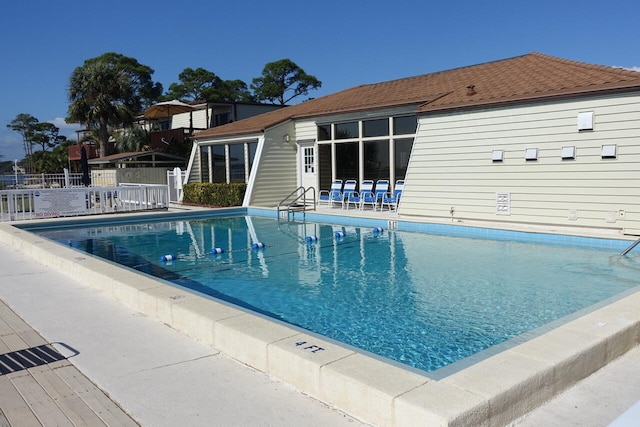 view of swimming pool with a patio