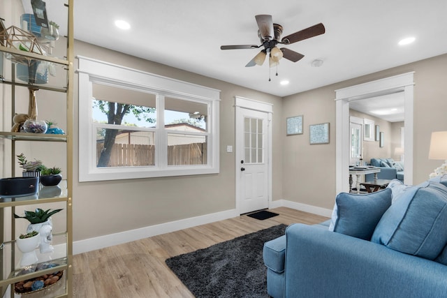 entrance foyer featuring ceiling fan and light hardwood / wood-style flooring