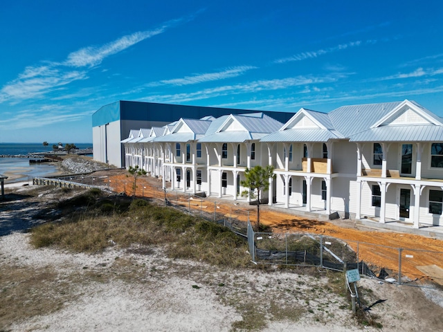 exterior space with a water view