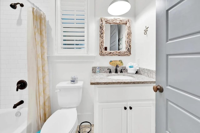 full bathroom featuring shower / tub combo, vanity, and toilet