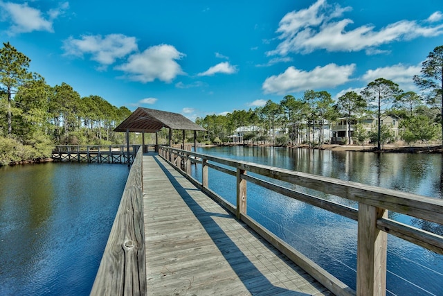 dock area featuring a gazebo and a water view