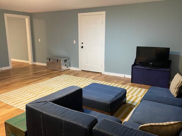 living room with hardwood / wood-style floors