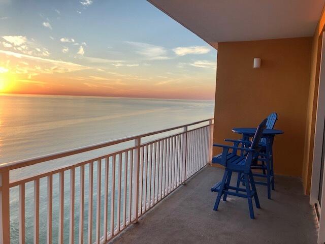 balcony at dusk with a water view