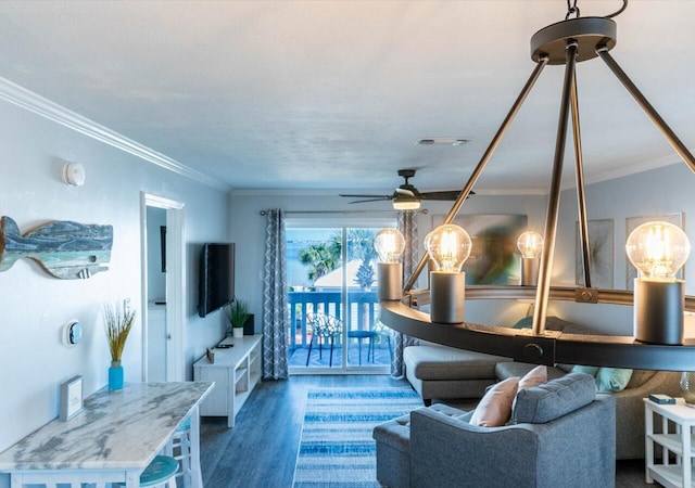 living room with ceiling fan, ornamental molding, and dark wood-type flooring