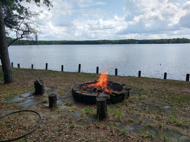 view of water feature featuring a fire pit