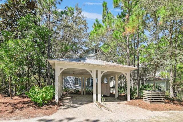 view of property's community with a carport