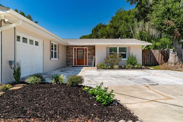 ranch-style house with a garage