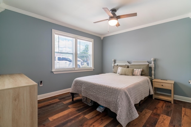 bedroom with crown molding, dark hardwood / wood-style floors, and ceiling fan