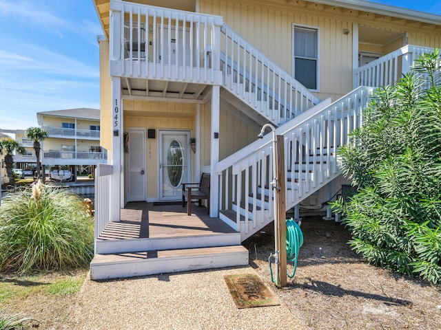 doorway to property featuring a balcony