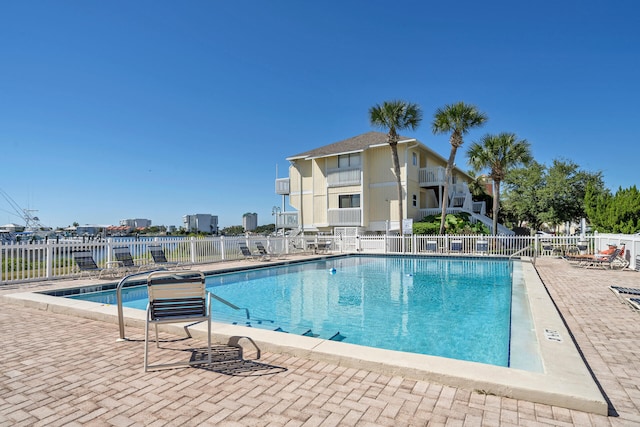 view of swimming pool featuring a patio