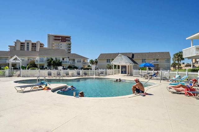 view of pool featuring a patio area