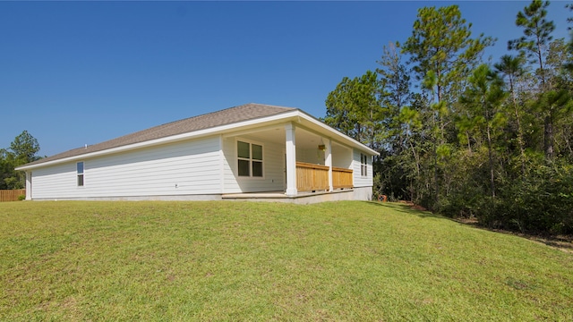 view of home's exterior featuring a yard