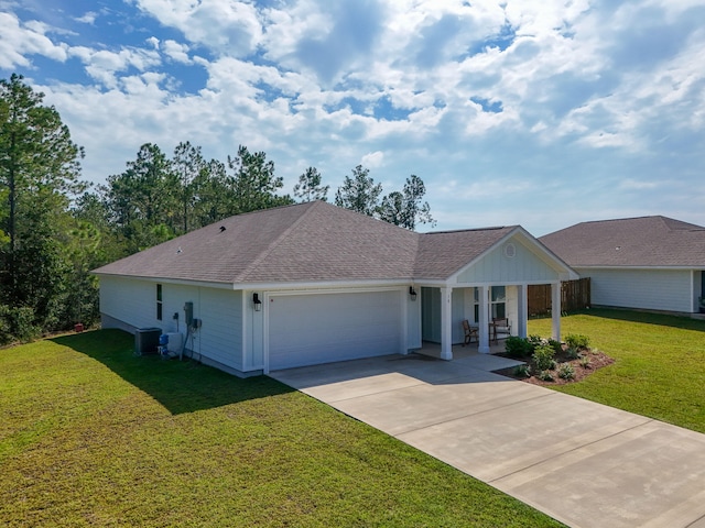 ranch-style house featuring central AC, a porch, a front yard, and a garage