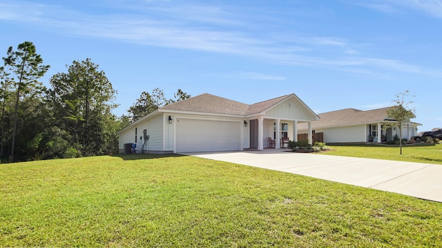 ranch-style home featuring central air condition unit, a front yard, and a garage