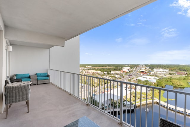 balcony featuring a water view