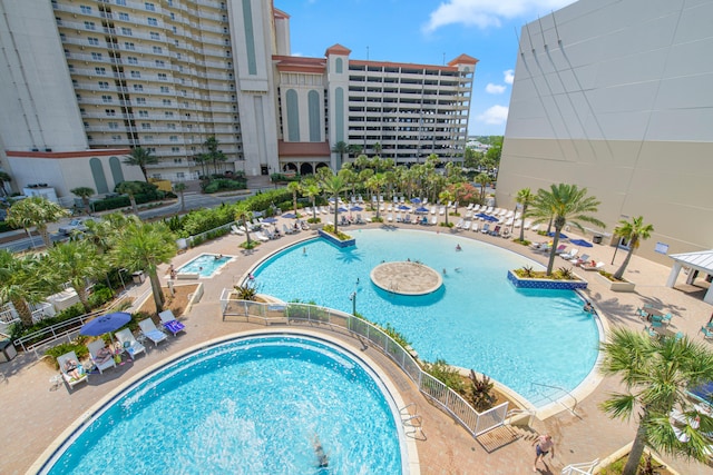 view of swimming pool featuring a patio