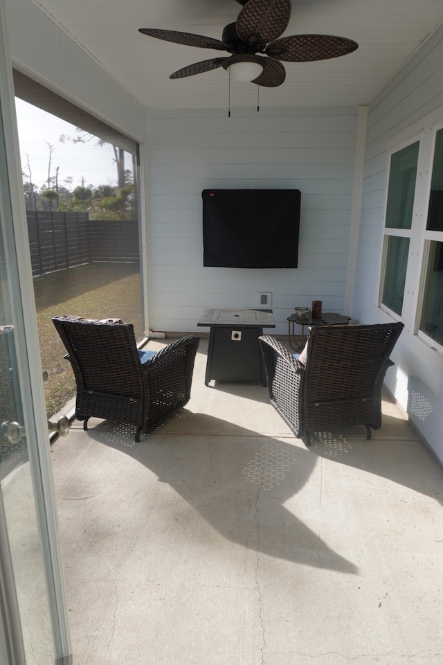 view of patio featuring an outdoor living space and ceiling fan