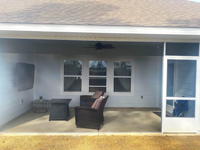 view of patio featuring ceiling fan