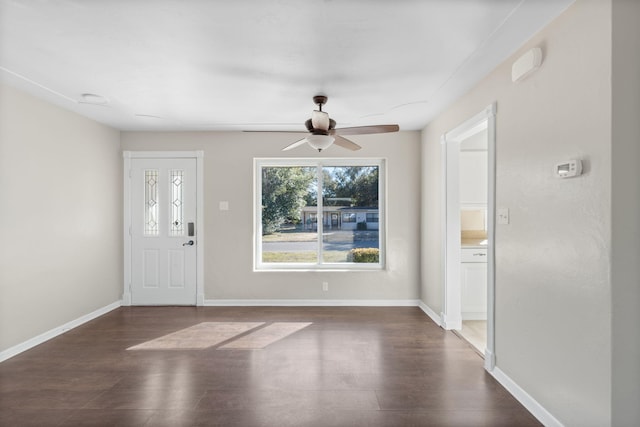 entryway with ceiling fan and dark hardwood / wood-style flooring