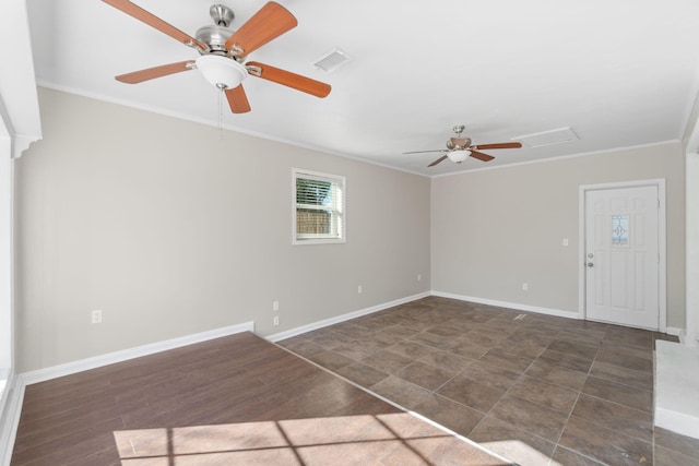 empty room featuring ornamental molding