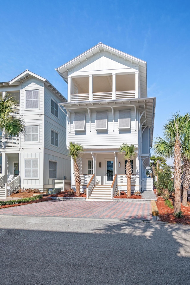 view of front of property featuring stairs