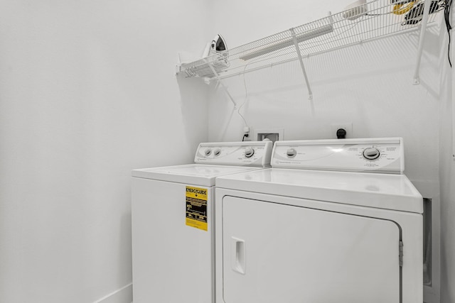 laundry area featuring independent washer and dryer