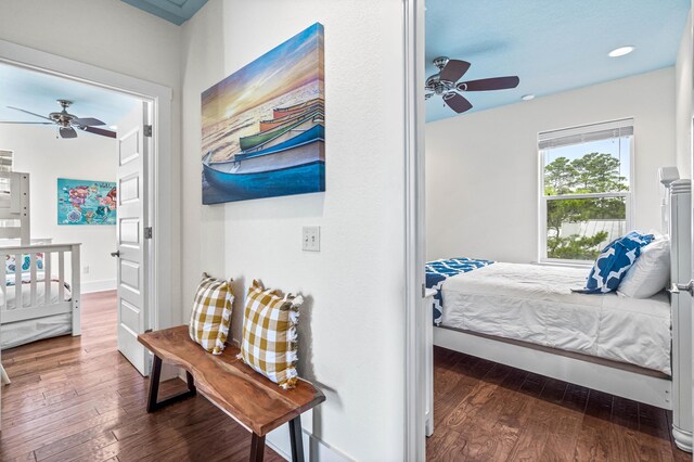 bedroom with dark wood-type flooring and ceiling fan