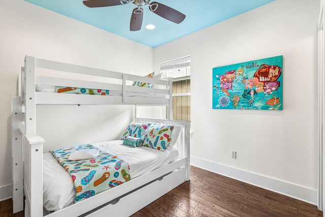 bedroom featuring dark wood-type flooring and ceiling fan