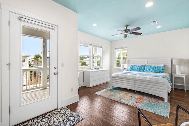 bedroom featuring access to outside, dark hardwood / wood-style floors, and ceiling fan