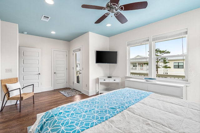 bedroom featuring dark wood-type flooring and ceiling fan