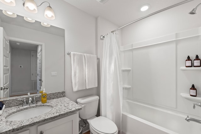 full bathroom with vanity, toilet, and shower / bath combo with shower curtain