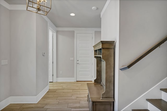 interior space with wood-type flooring and a chandelier