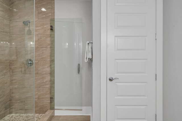 bathroom with an enclosed shower