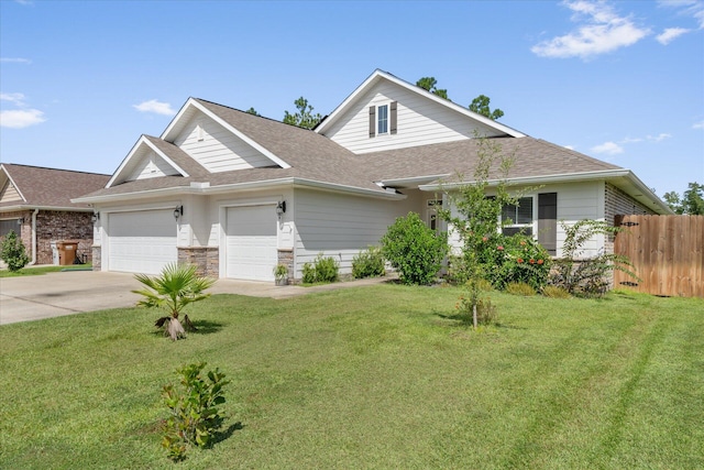 view of front facade featuring a garage and a front lawn